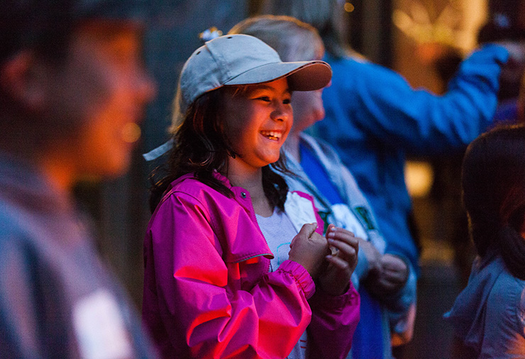 A child with autism smiling at our Overnight Camp program.